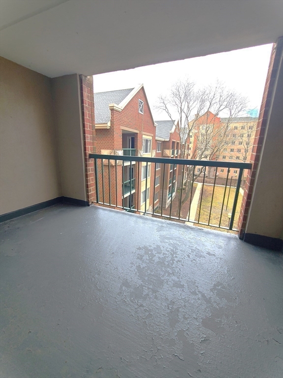 1 South Point Drive, Unit 404 Boston, MA 02125 - Photo 12 of 15 a view of an empty room with a window