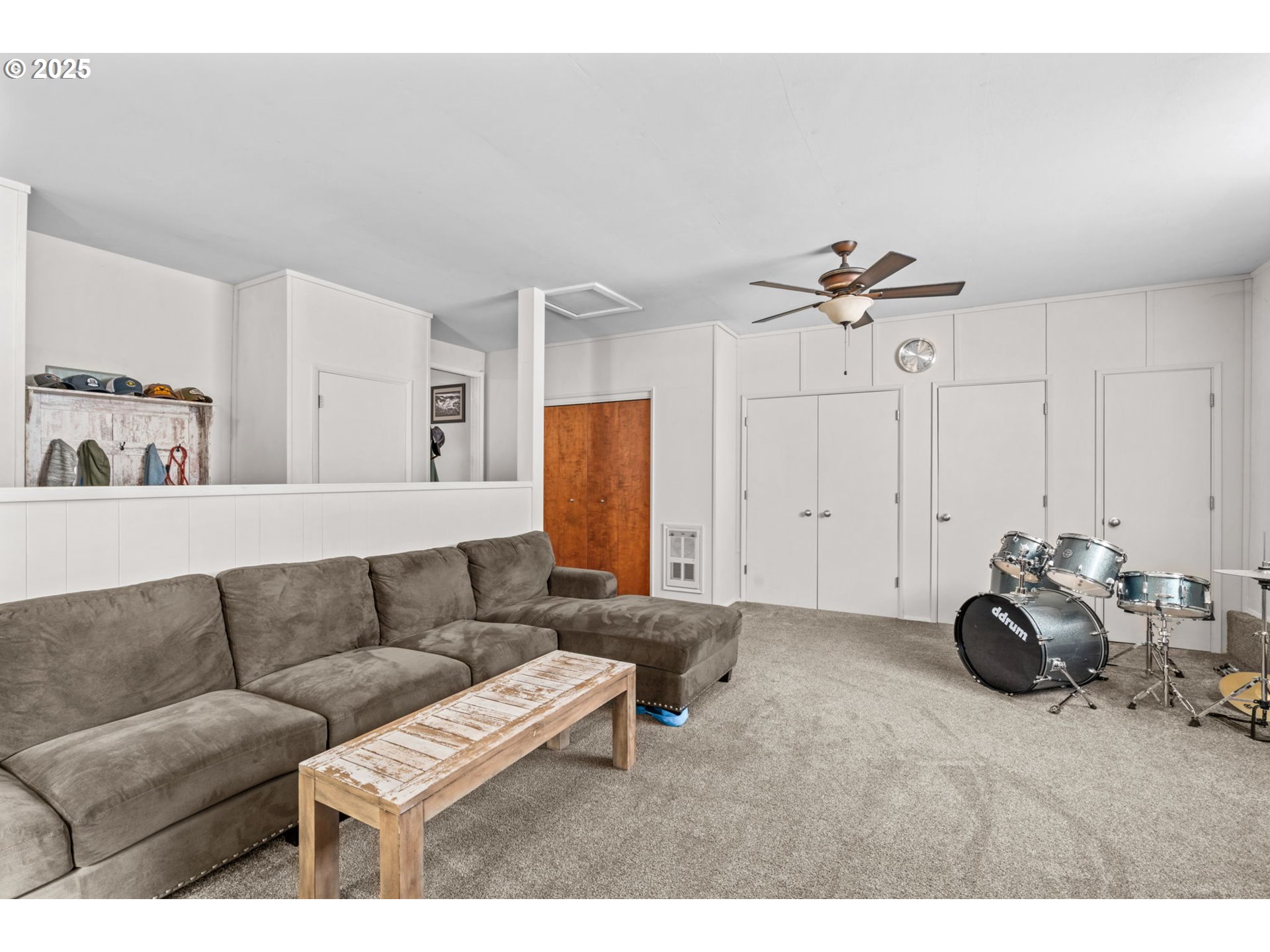 1490 Carobelle Court Cottage Grove, OR 97424 - Photo 11 of 28 a living room with furniture and a wooden floor