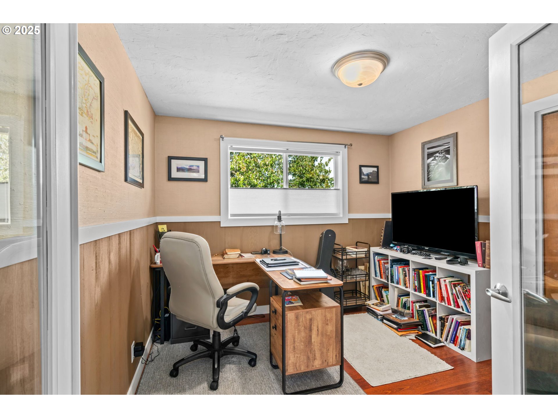 1490 Carobelle Court Cottage Grove, OR 97424 - Photo 13 of 28 a living room with furniture and a flat screen tv