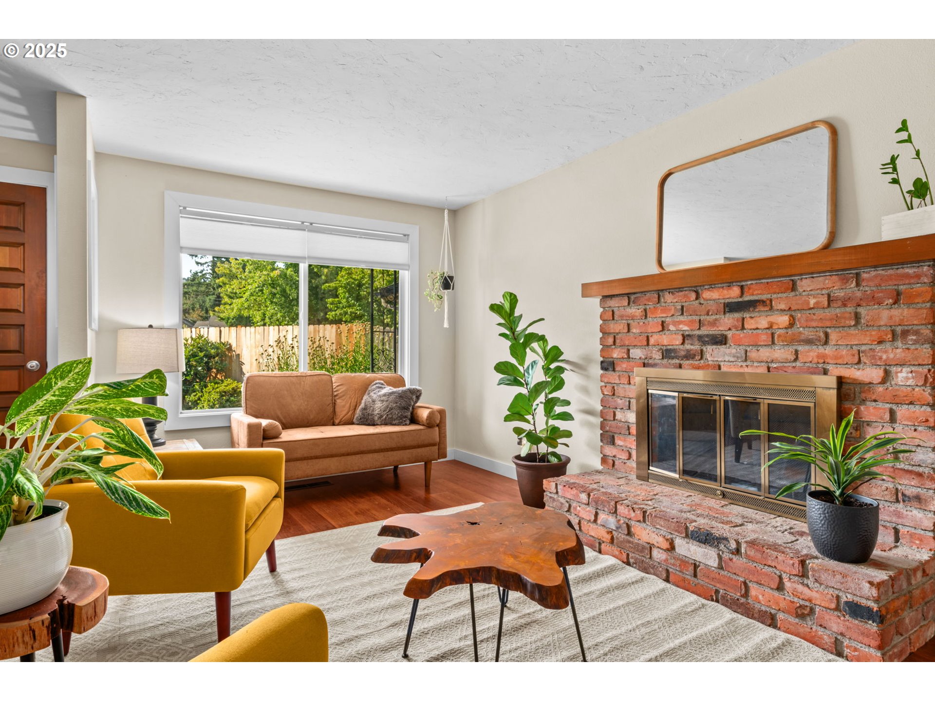 1490 Carobelle Court Cottage Grove, OR 97424 - Photo 2 of 28 a living room with furniture potted plant and a large window