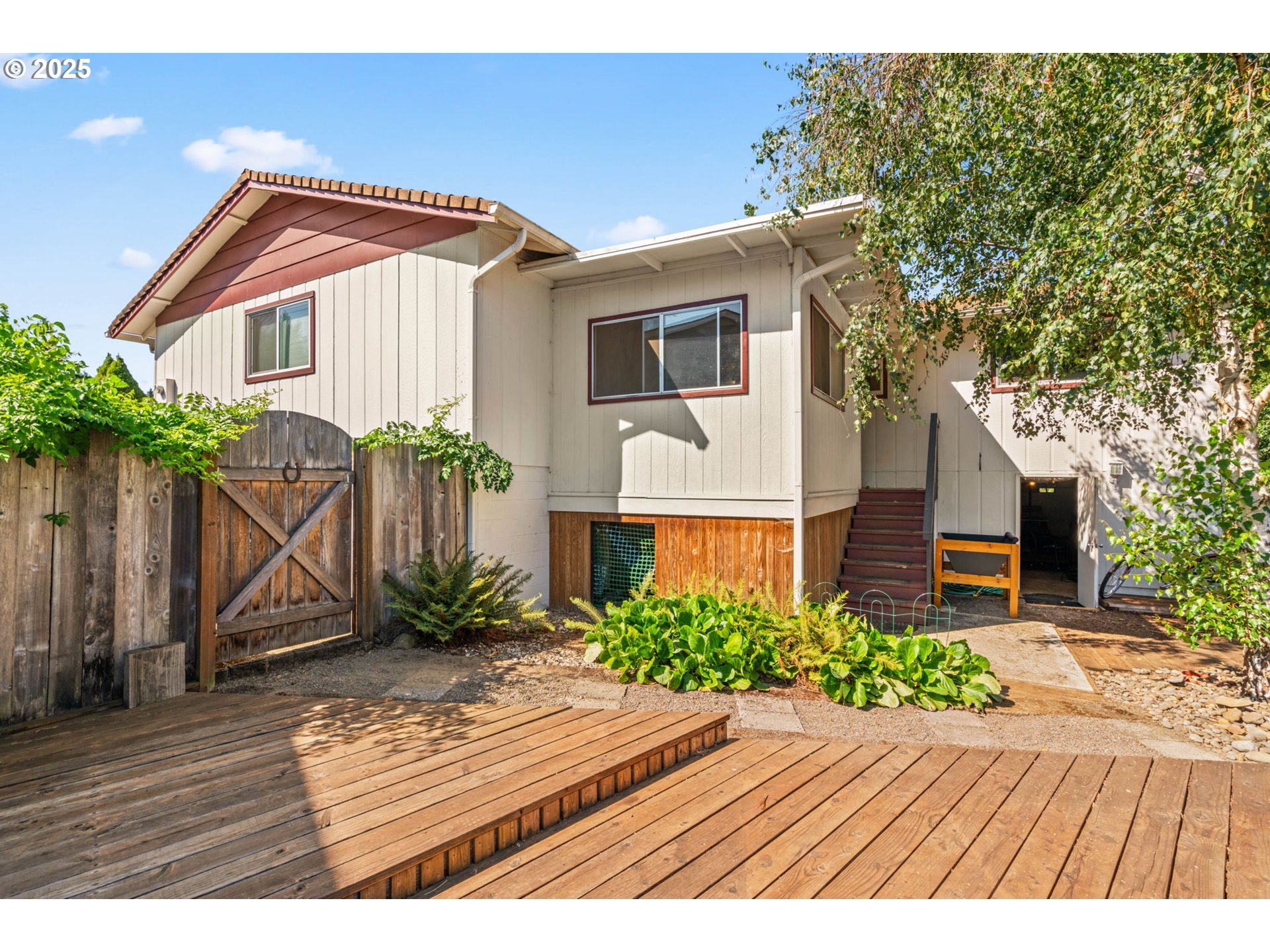 1490 Carobelle Court Cottage Grove, OR 97424 - Photo 22 of 28 a front view of a house with a yard