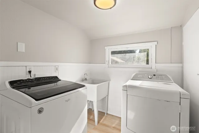 a utility room with dryer and washer