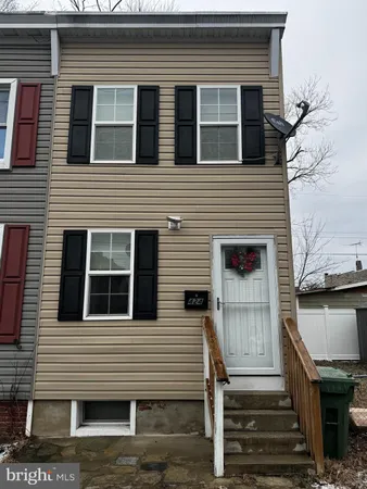 a front view of a house with a door