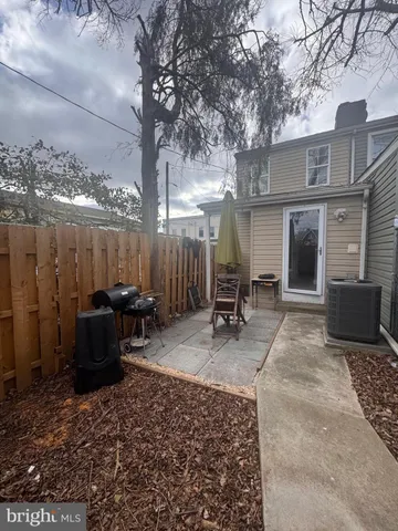 a view of a chairs and tables in the patio