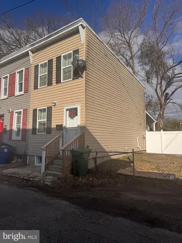 a view of residential houses with street