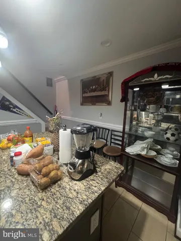 a kitchen with a stove and cabinets