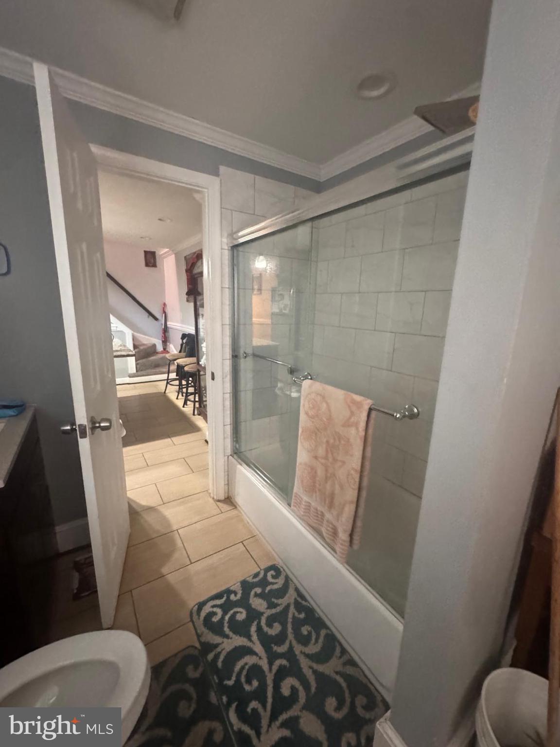 424 Freeman Street Baltimore, MD 21225 - Photo 9 of 23 a bathroom with a bathtub and toilet