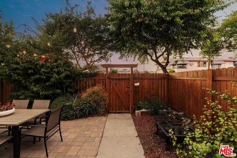 a view of an outdoor sitting area with chairs