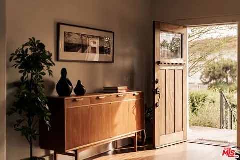 a room with furniture and a window