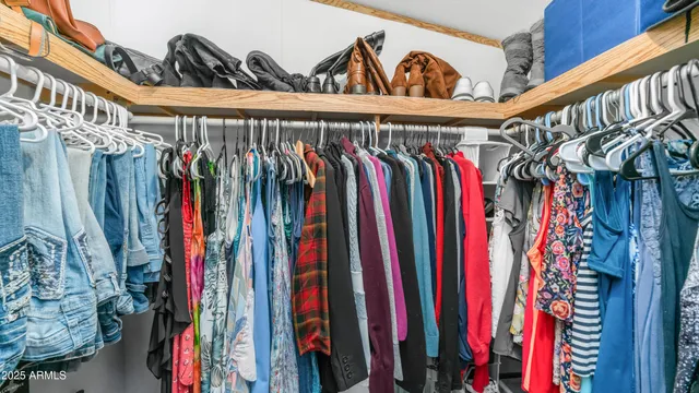 a view of a workspace with furniture and a workspace