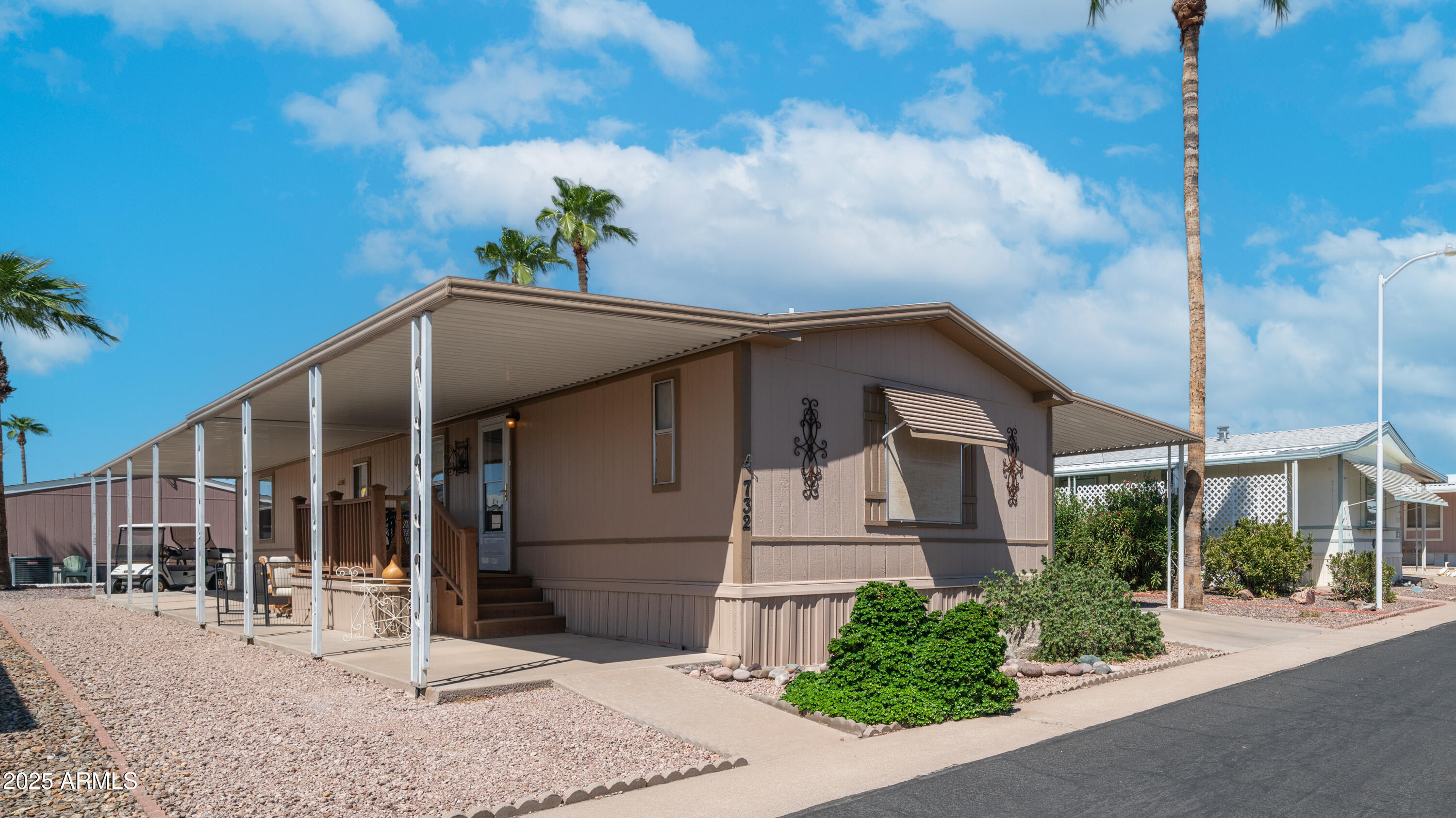 301 South Signal Butte Road, Unit 732 Apache Junction, AZ 85120 - Photo 2 of 44 301 S Signal Butte Rd Lot 732 Exterior P