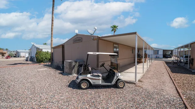 a view of a cars park in front of house