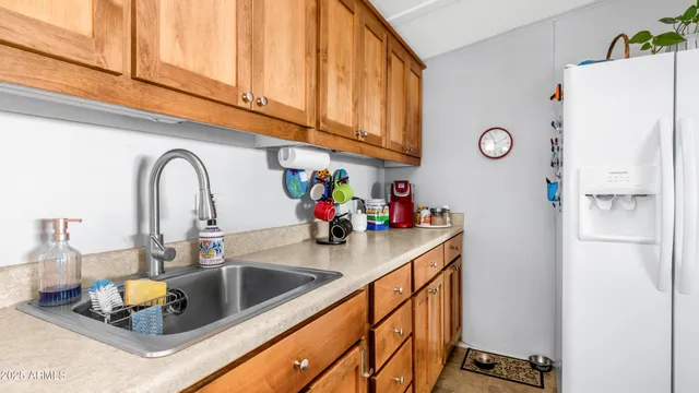a kitchen with a stove and cabinets