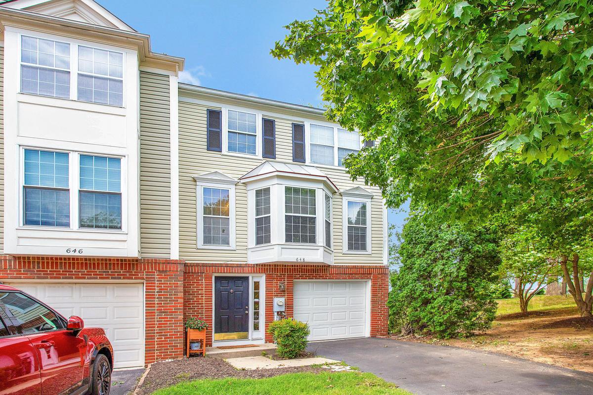 648 Howards Loop, Unit 19 Annapolis, MD 21401 - Photo 2 of 35 Lush greenery to the side, adds some nature.