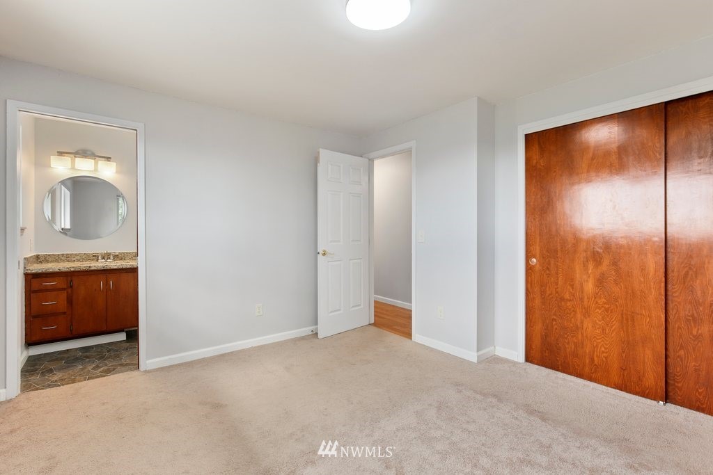 1015 Jones Avenue South Renton, WA 98057 - Photo 22 of 40 an empty room with a bathroom and a sink