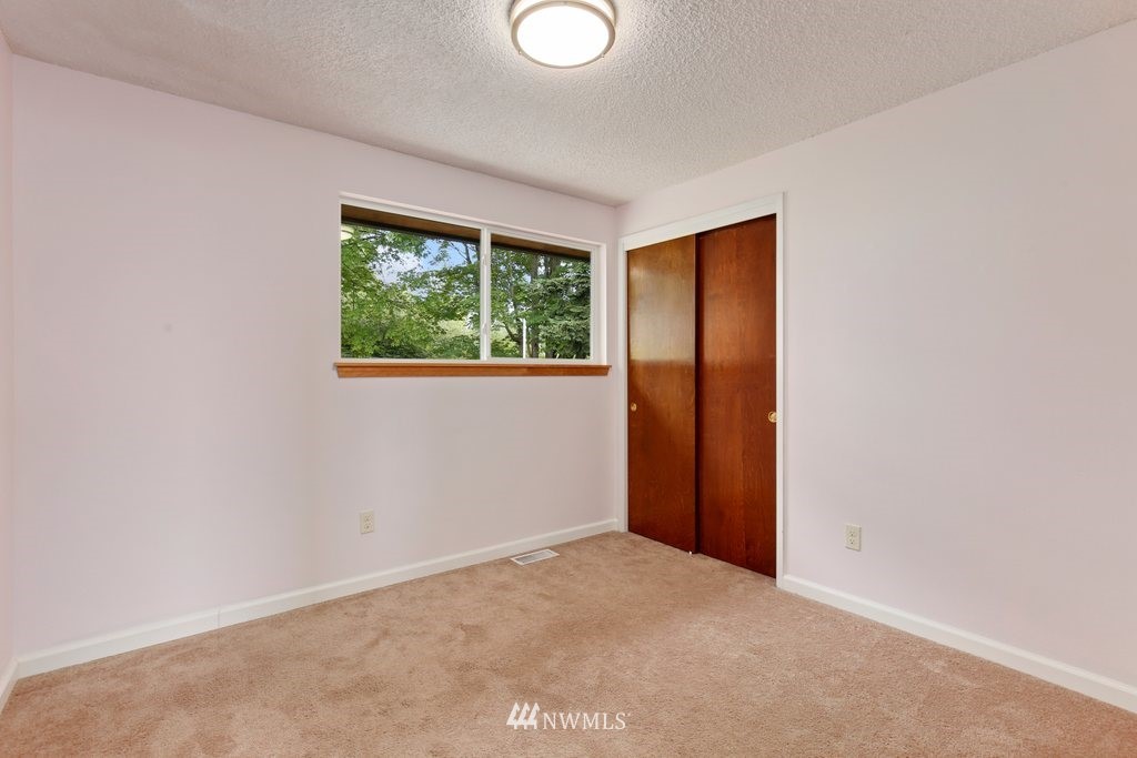 1015 Jones Avenue South Renton, WA 98057 - Photo 24 of 40 an empty room with a window
