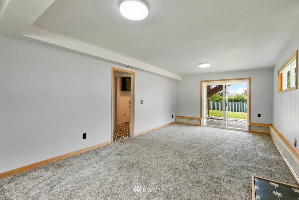1015 Jones Avenue South Renton, WA 98057 - Photo 29 of 40 a view of an empty room with a window
