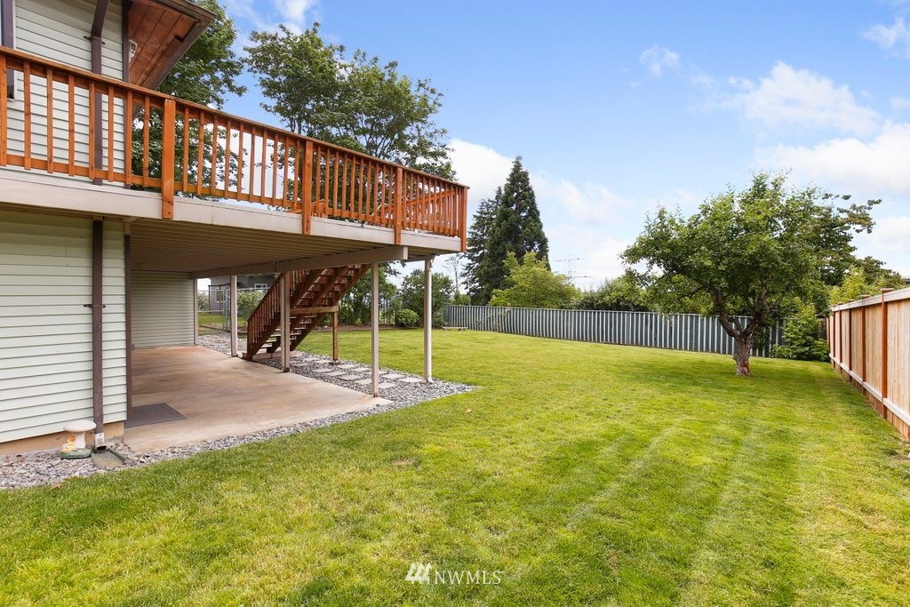 1015 Jones Avenue South Renton, WA 98057 - Photo 33 of 40 a view of a house with a yard and basketball court