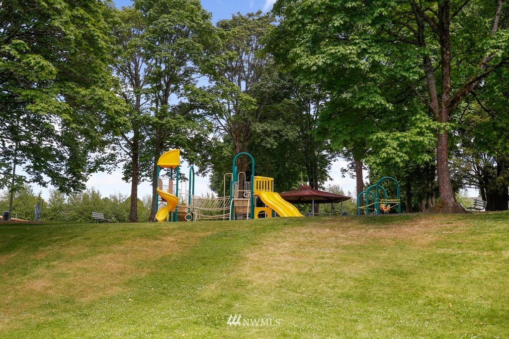 1015 Jones Avenue South Renton, WA 98057 - Photo 39 of 40 a view of a park with swings and slides