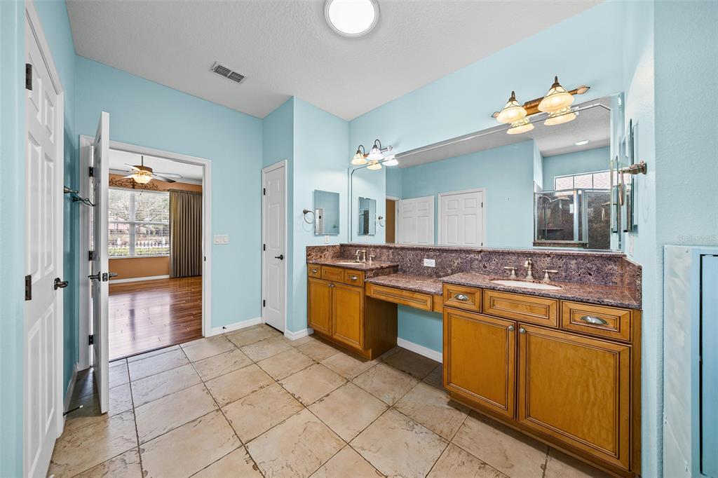8713 Southwest 83rd Court Road Ocala, FL 34481 - Photo 15 of 23 a kitchen with a sink and cabinets