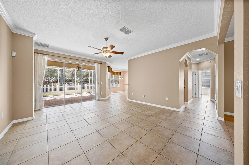 8713 Southwest 83rd Court Road Ocala, FL 34481 - Photo 2 of 23 a view of an empty room and window