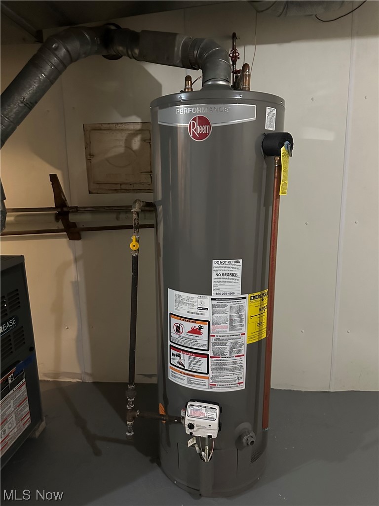 664 Ecton Road Akron, OH 44303 - Photo 30 of 35 Utility room with gas water heater