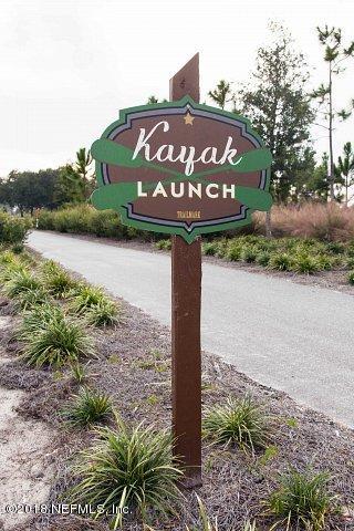 312 Clarys Run St. Augustine, FL 32092 - Photo 12 of 26 a view of a street with a sign on the side of the road