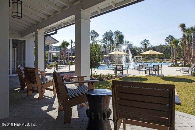 312 Clarys Run St. Augustine, FL 32092 - Photo 14 of 26 a room with furniture and a floor to ceiling window