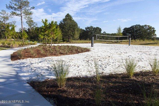 312 Clarys Run St. Augustine, FL 32092 - Photo 21 of 26 a view of swimming pool with a yard