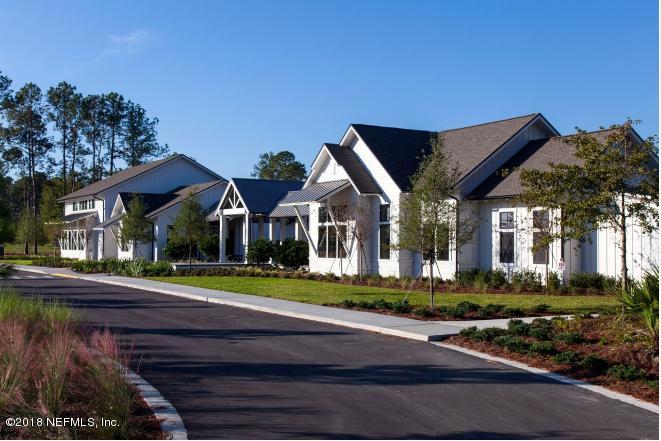 312 Clarys Run St. Augustine, FL 32092 - Photo 6 of 26 a front view of a house with a yard