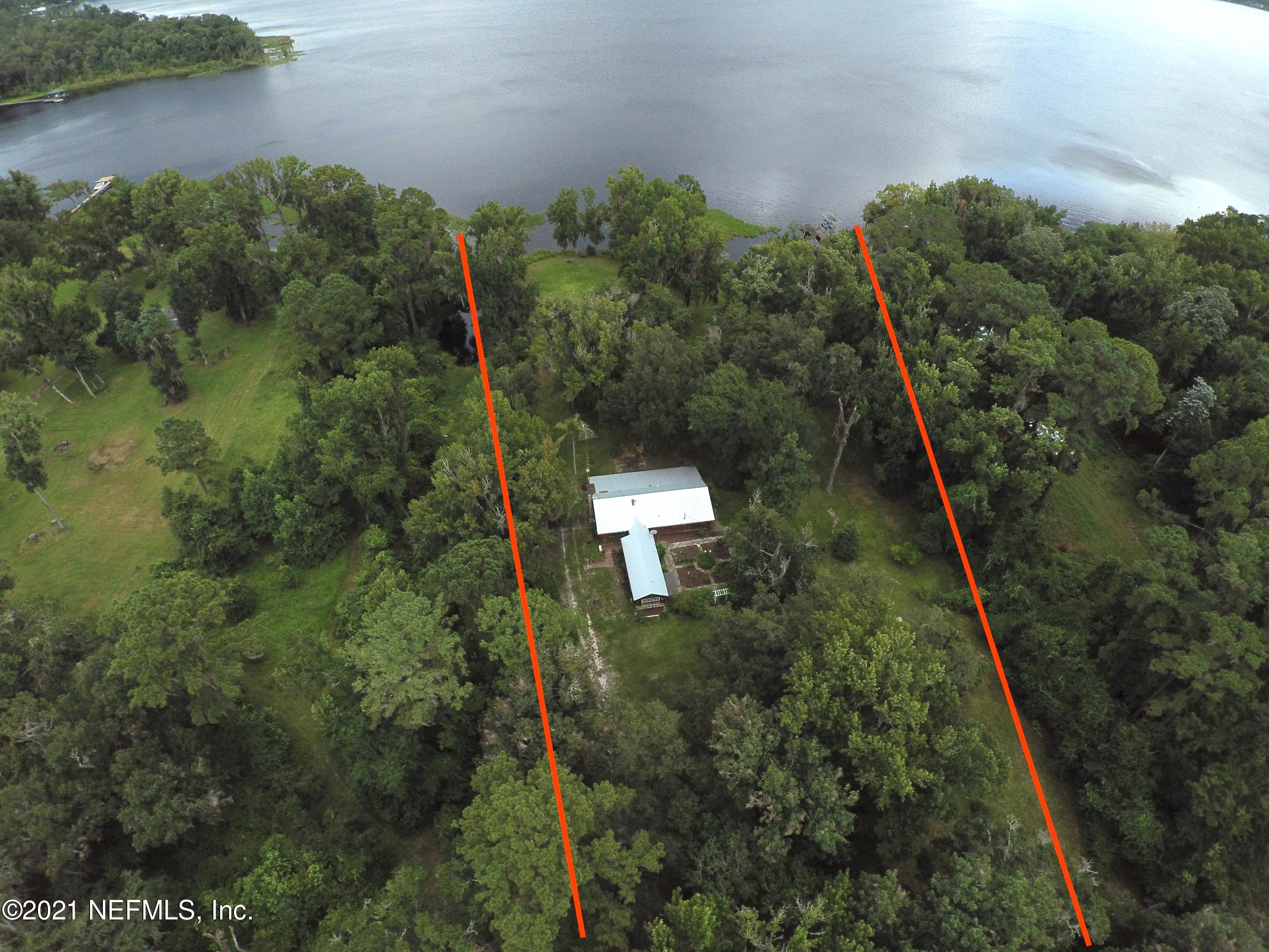 352 Tinsley Road Florahome, FL 32140 - Photo 3 of 54 a aerial view of a house with a yard