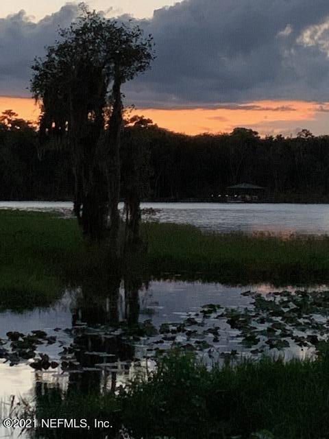352 Tinsley Road Florahome, FL 32140 - Photo 54 of 54 a view of a lake in front of house