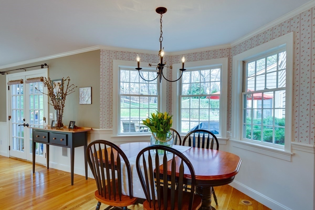 180 Highgate Street Needham, MA 02492 - Photo 13 of 31 a view of a dining room with furniture window and outside view