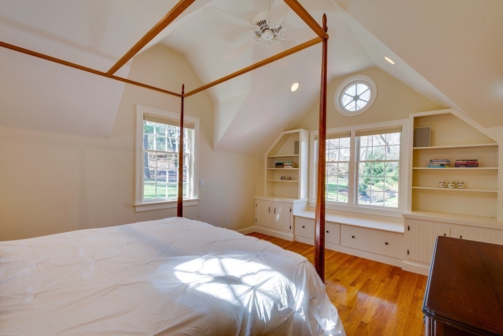 180 Highgate Street Needham, MA 02492 - Photo 17 of 31 a bedroom with a bed and a window