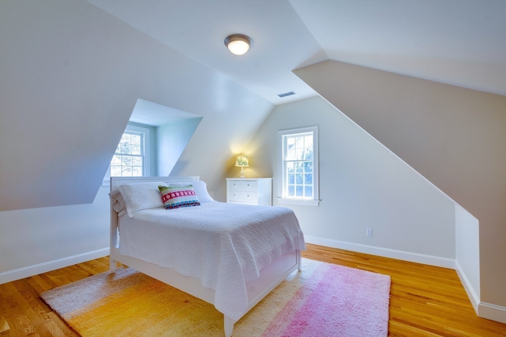 180 Highgate Street Needham, MA 02492 - Photo 23 of 31 a bedroom with a bed and window