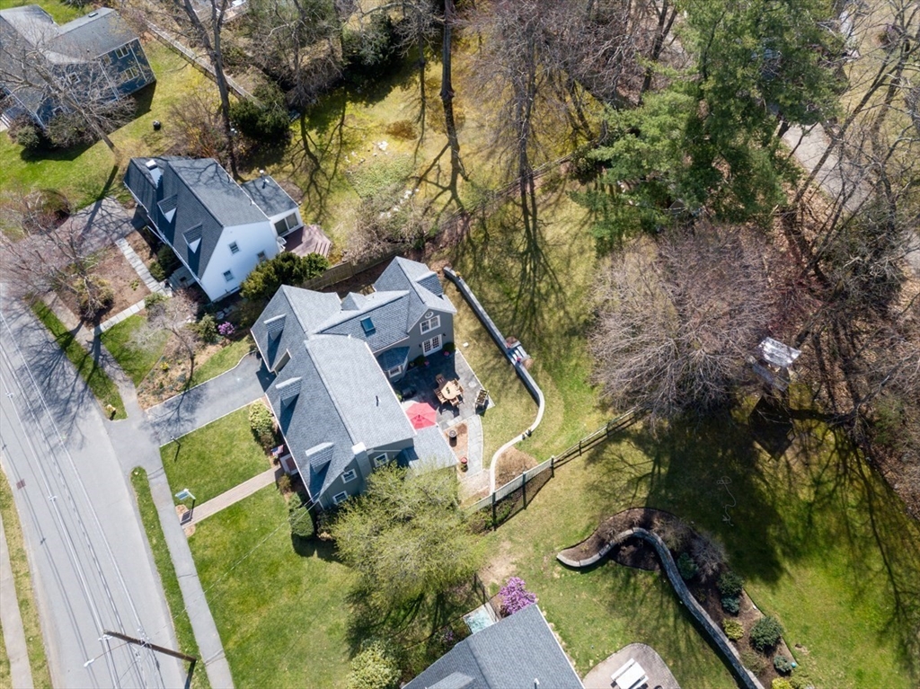 180 Highgate Street Needham, MA 02492 - Photo 31 of 31 an aerial view of a house with garden space and street view