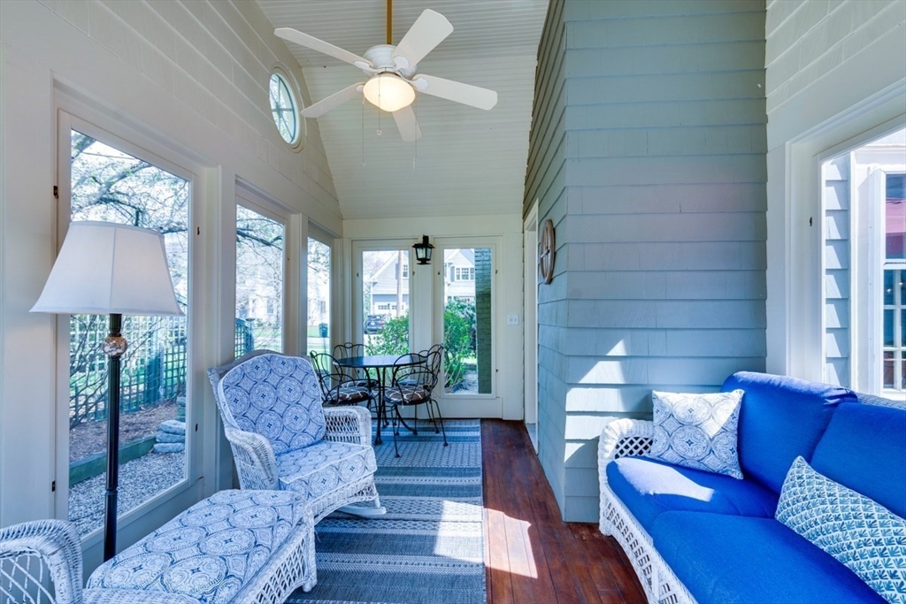 180 Highgate Street Needham, MA 02492 - Photo 6 of 31 a living room with furniture and a large window