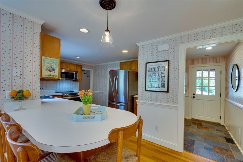180 Highgate Street Needham, MA 02492 - Photo 10 of 31 a kitchen with sink and refrigerator