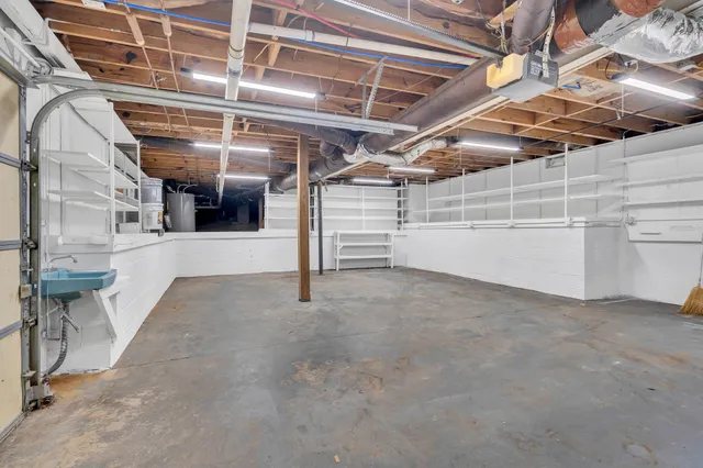 a view of a room with wooden walls