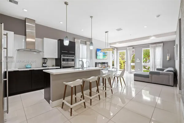 $575,000 | 10305 Northwest 63rd Terrace, Unit 105, Doral, FL 33178