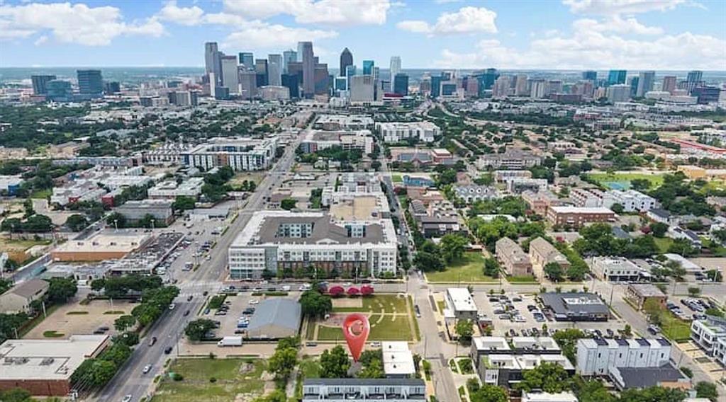1718 Ripley Street Dallas, TX 75204 - Photo 1 of 33 Urban landscape featuring the prominent Dallas central business district in the distance