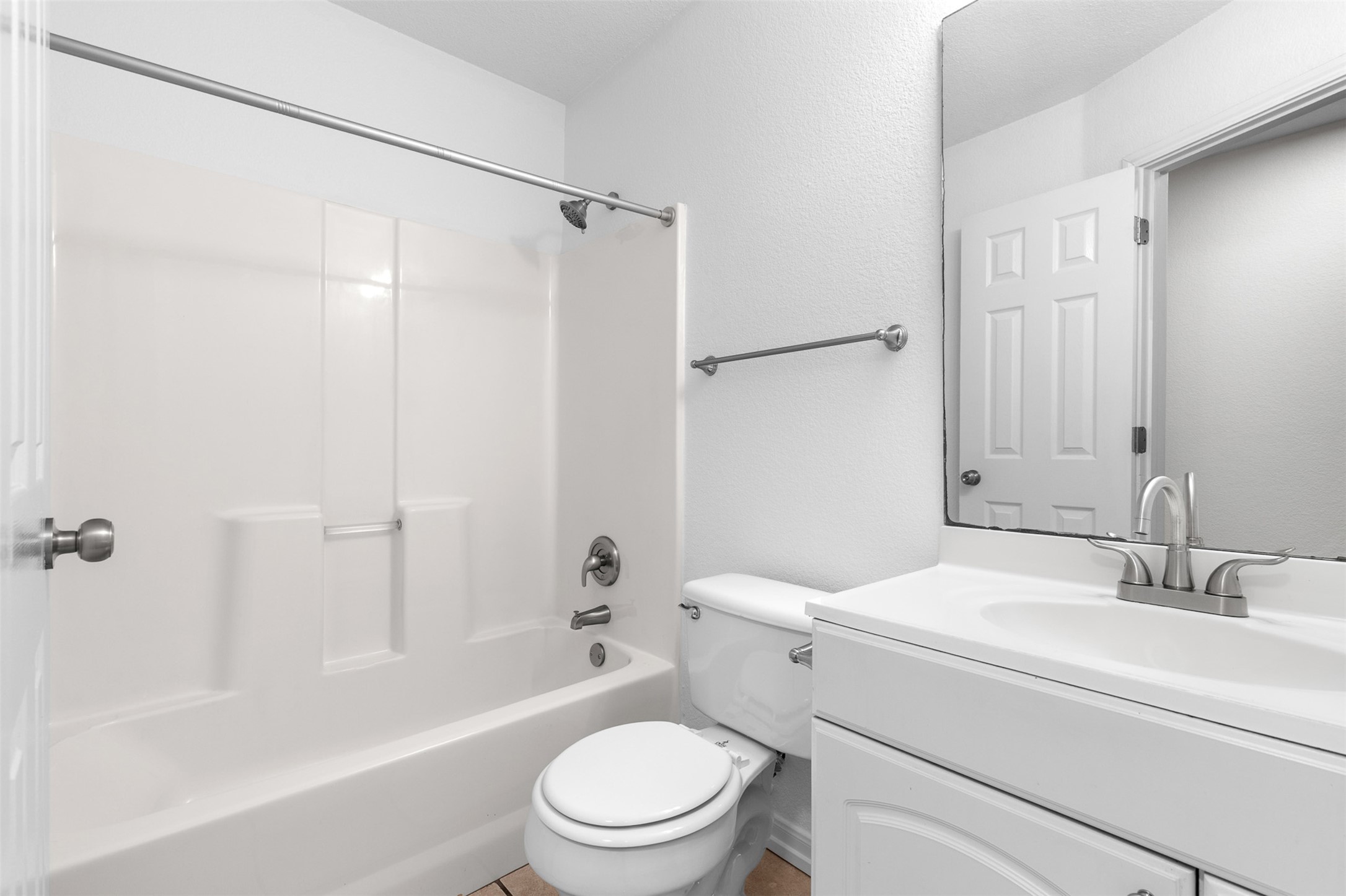 2602 Peach Tree Lane Cedar Park, TX 78613 - Photo 7 of 14 Full bath with vanity and a shower / washtub combination.