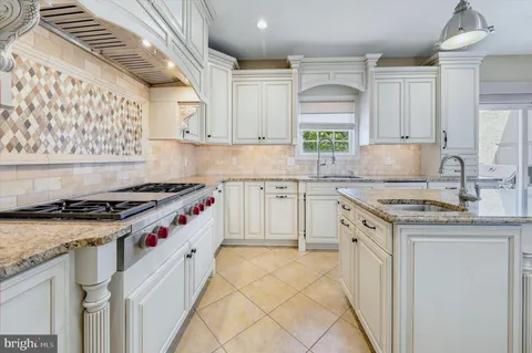 a spacious bathroom with a double vanity sink mirror and