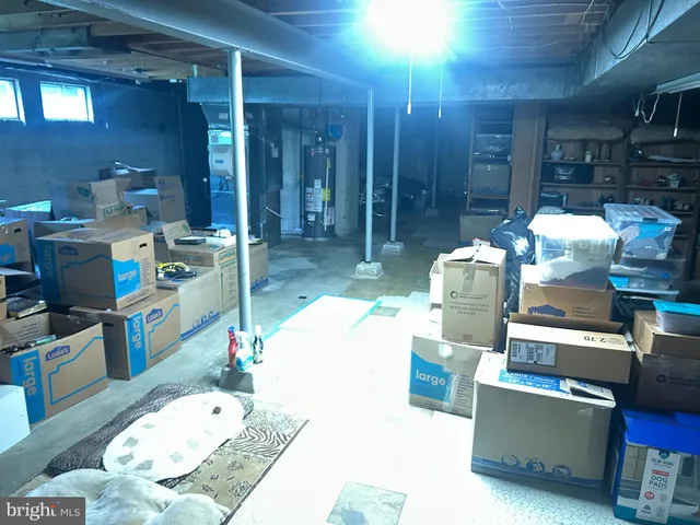 a balcony with wooden floor and yard in the back