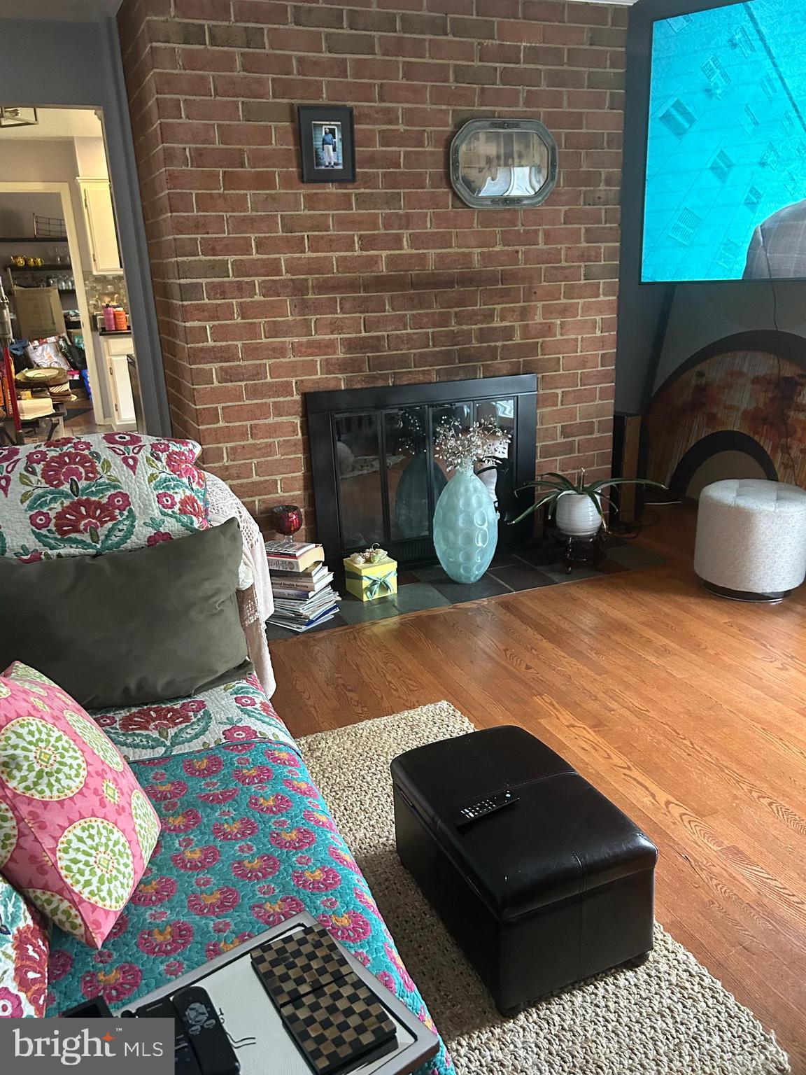 11500 Chantilly Lane Bowie, MD 20721 - Photo 6 of 13 a living room with furniture and a fireplace