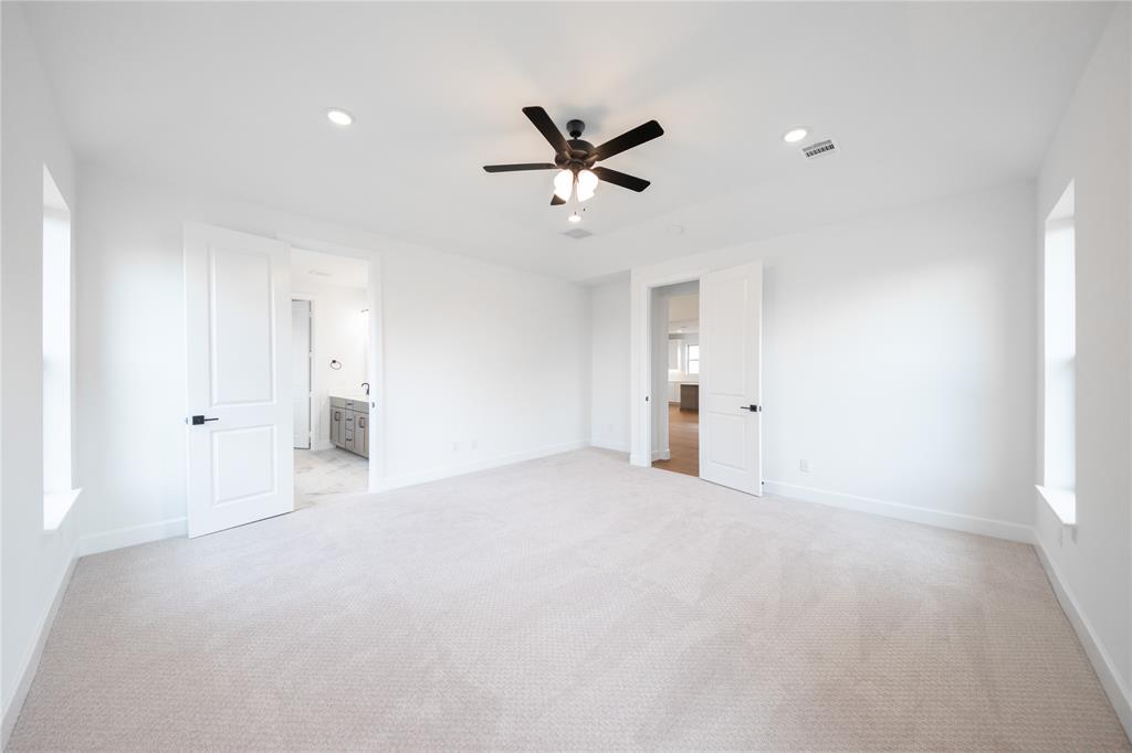 2715 Triumph Court Heath, TX 75126 - Photo 9 of 30 a view of an empty room