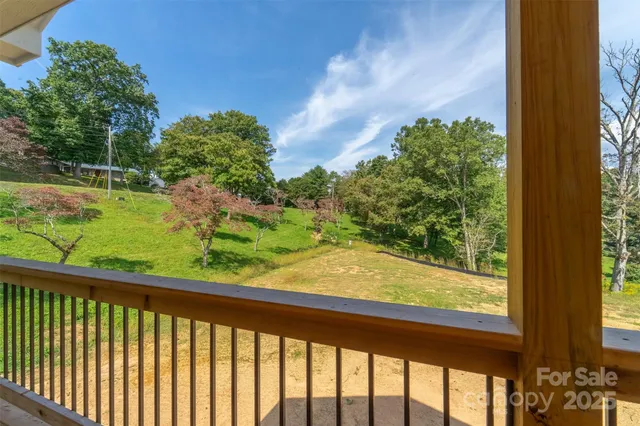 a view of a porch and a yard