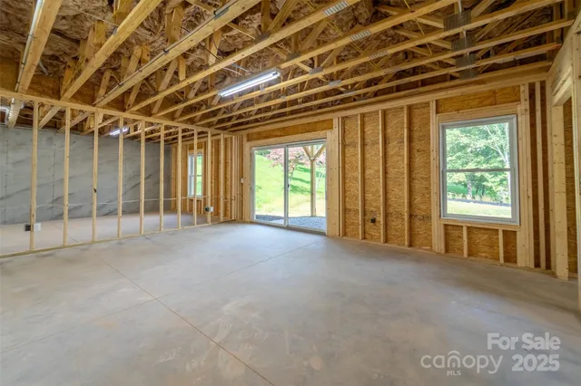 a view of an empty room with a sliding door