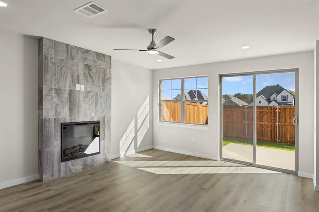 a view of livingroom with furniture and a fireplace