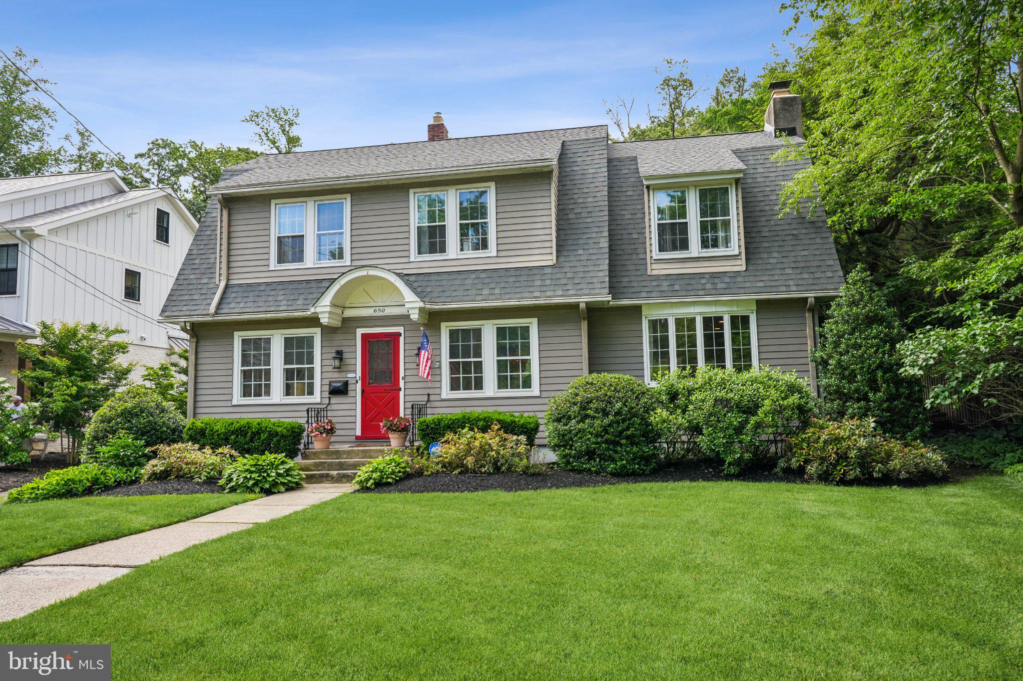 Charming home with vibrant curb appeal.
